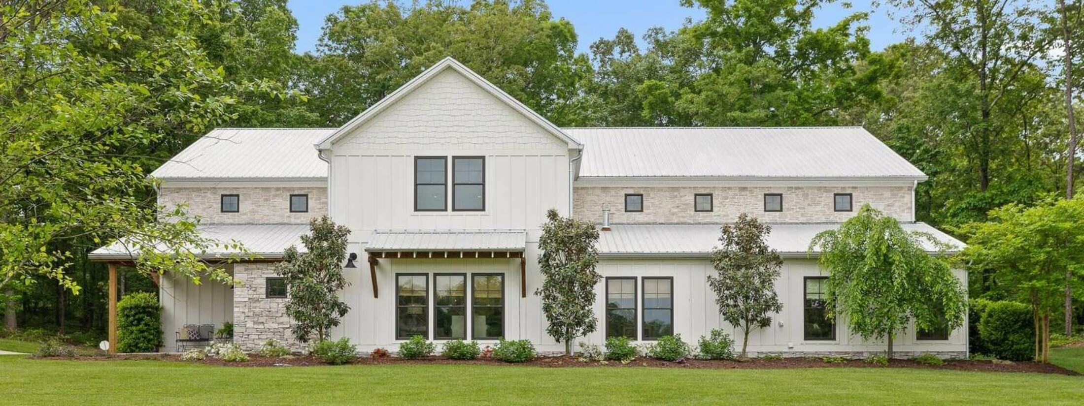 Modern farmhouse-style home exterior, representative of the residential team's listings